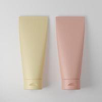 Blank yellow and pink packaging tube  photo