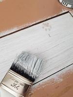 White paint on wooden surface photo