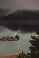 Moody lake in the rain photo