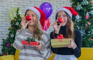 Two women celebrating Christmas photo
