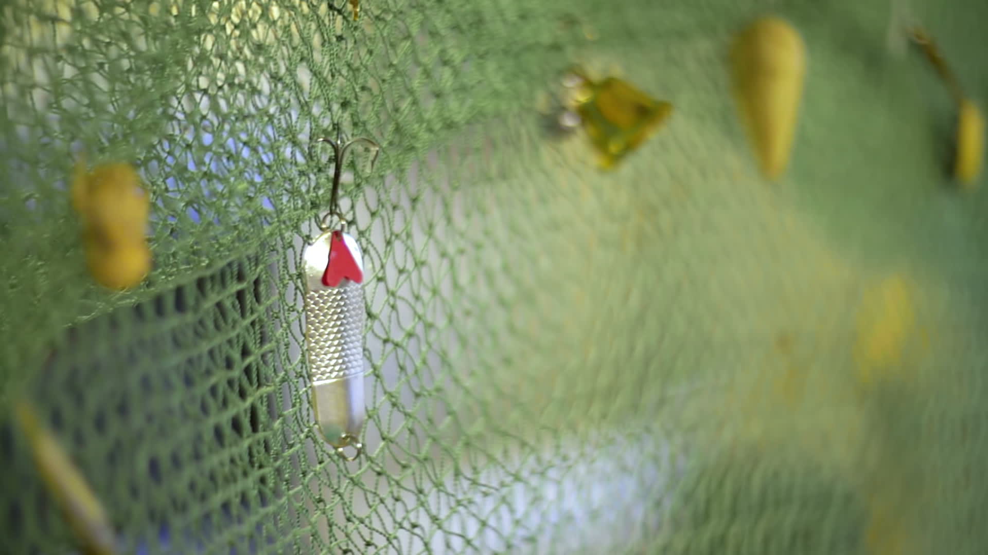 Spinner bait on the fishing net. 1273770 Stock Video at Vecteezy