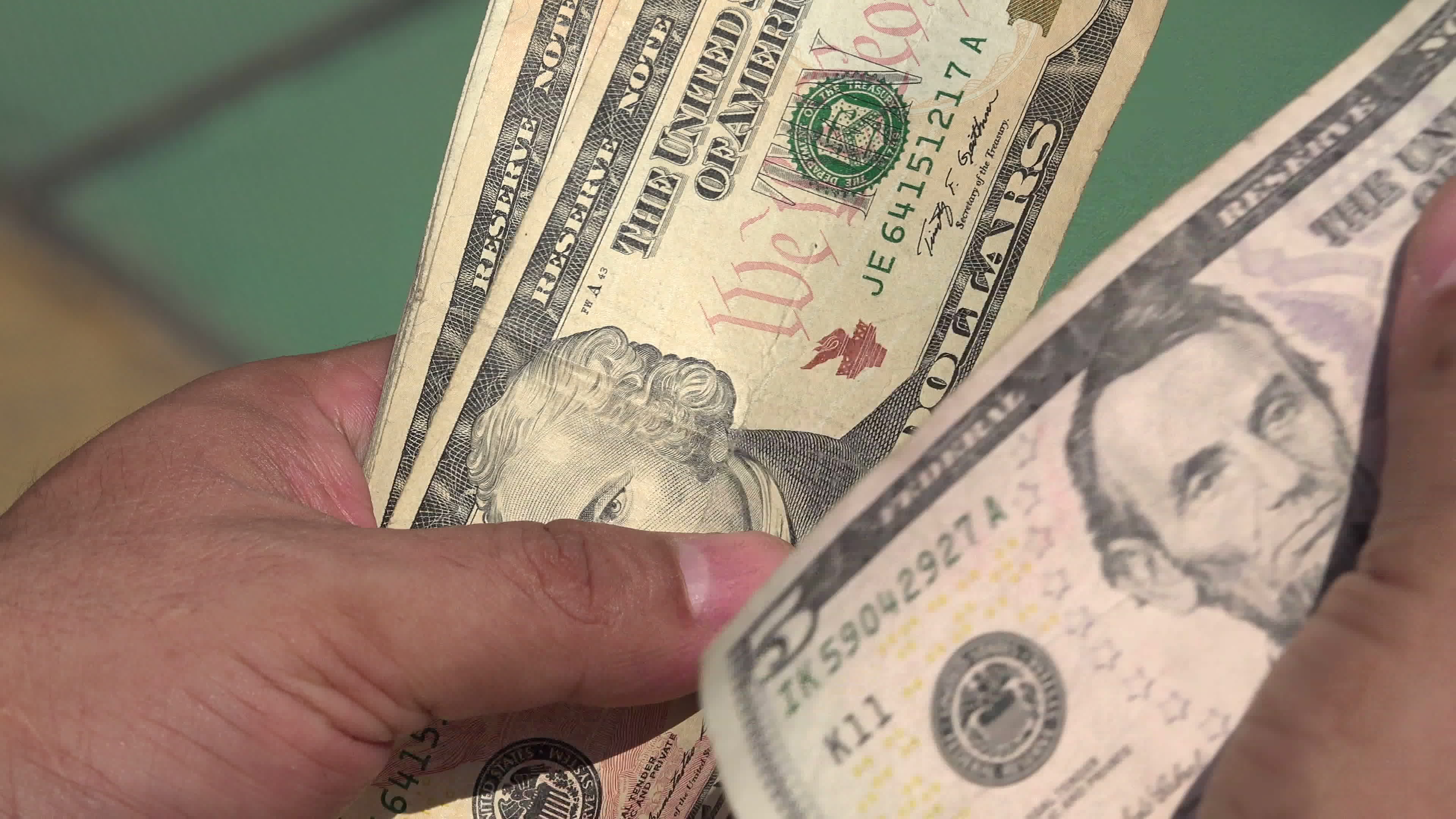 Man Counting Paper Money 1278946 Stock Video at Vecteezy