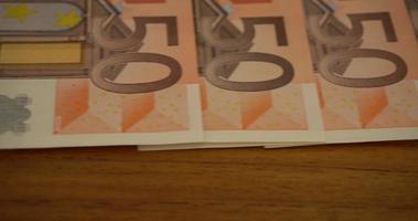 Tracking shot of fifty Euro cash money video