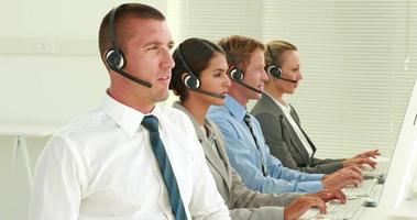 Business team working in call center