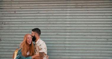 Bearded Hipster guy tickling is redhead girl friend in slow motion video