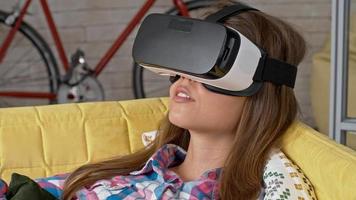 Young Woman Enjoying Movie in VR Headset video