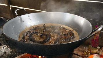 Deep fried snakes in wok video