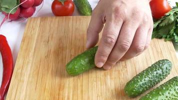Cutting fresh cucumber video