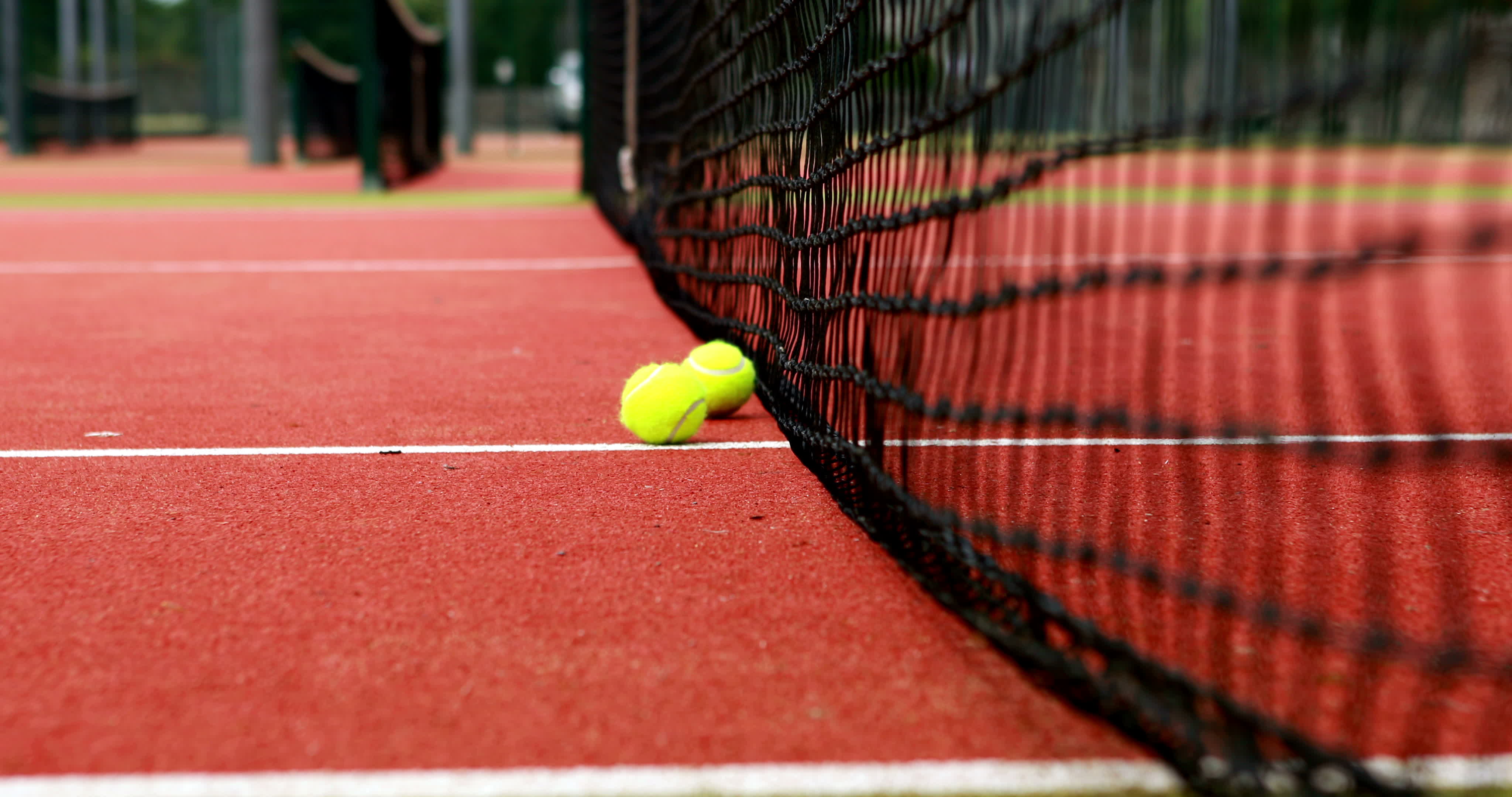 Tennis balls hitting the net 1289197 Stock Video at Vecteezy