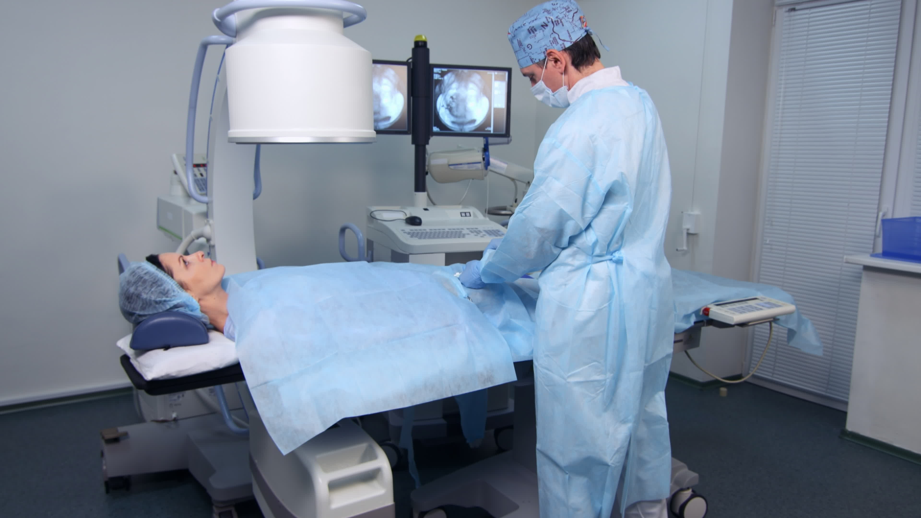Interventional Radiologist Performs Uterine Fibroid Embolization 1290809 Stock Video At Vecteezy