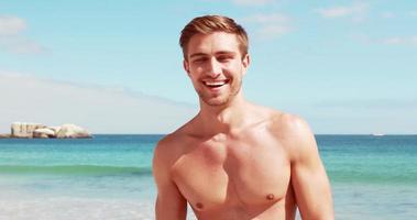 Attractive man laughing and looking at camera video