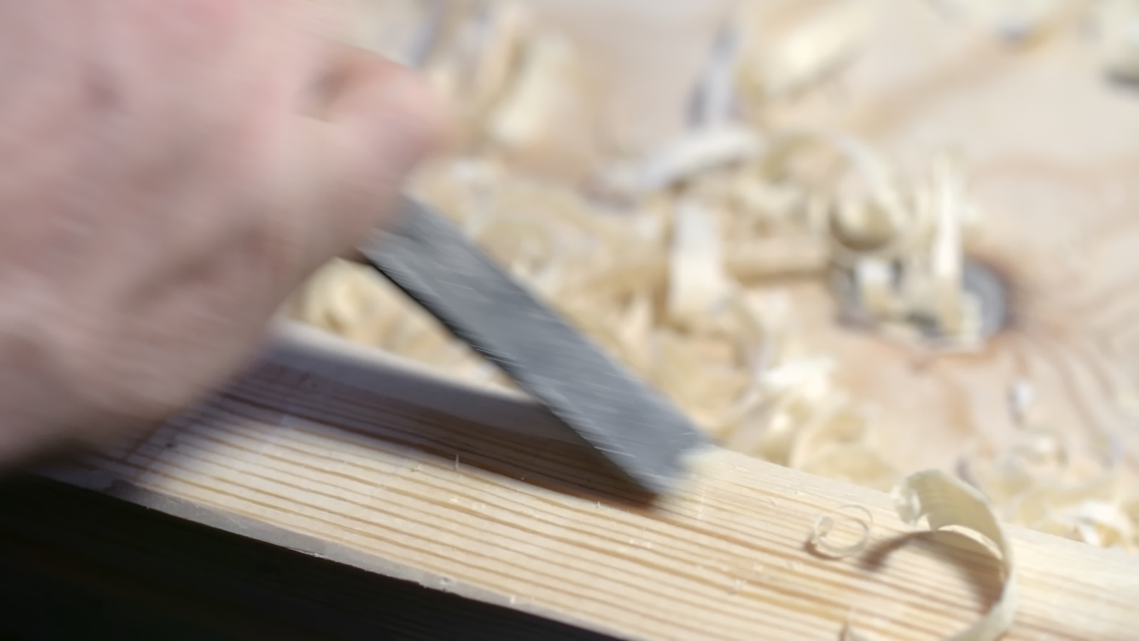 Shaving wood with chisel 1293343 Stock Video at Vecteezy