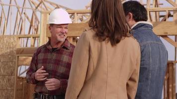 Couple speaking to contractor video
