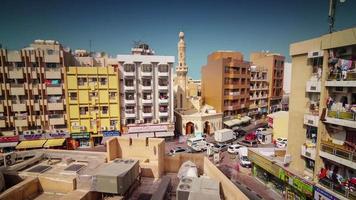 sunny day dubai city deira part bay roof top panorama 4k time lapse united arab emirates
