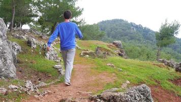 Tourist man walking trekking historical Lycian Way, Lycia Road, Turkey video