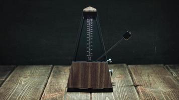 Vintage metronome beats the rhythm video