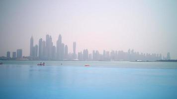sunny day dubai marina pool view time lapse video