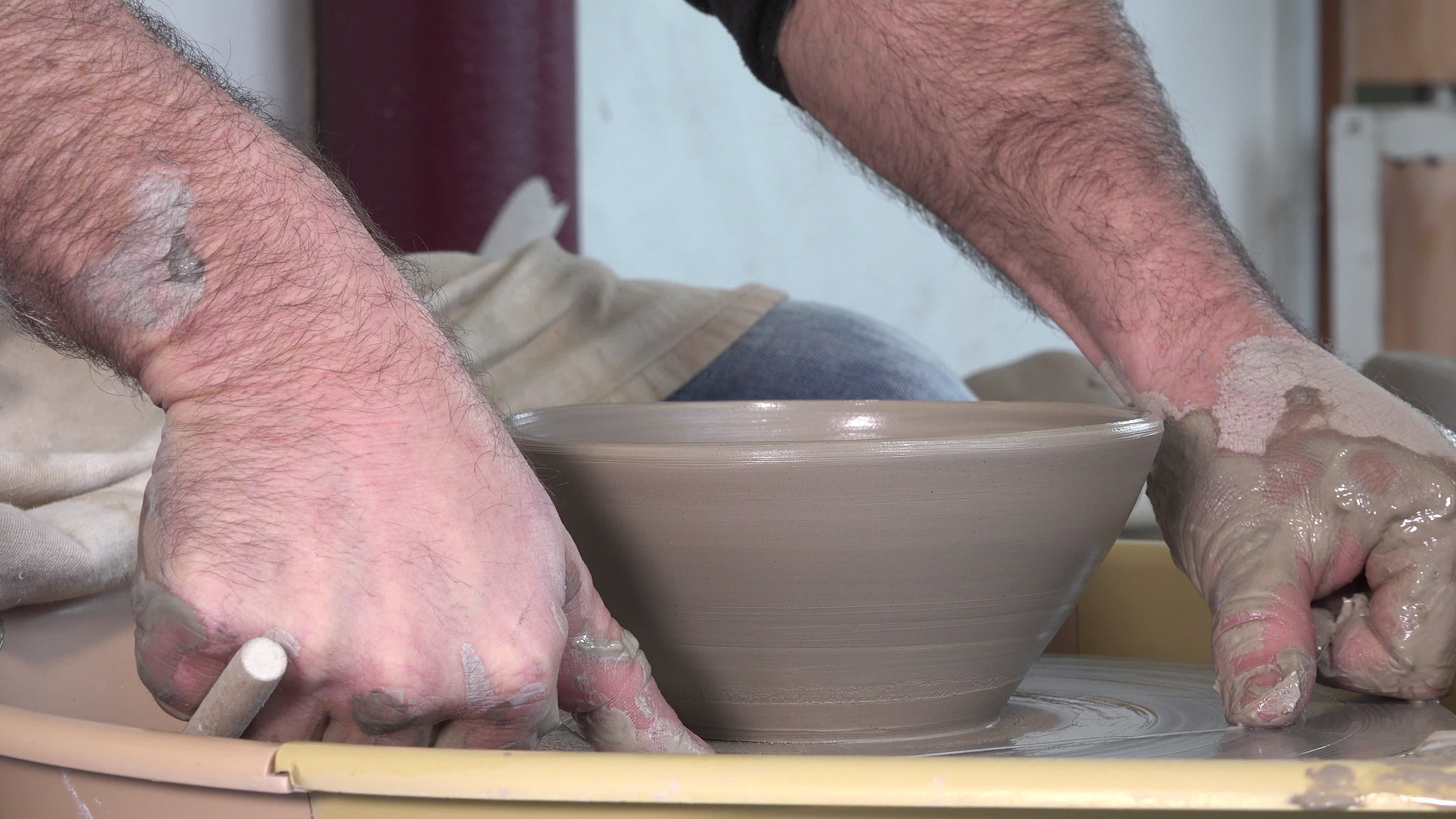 potter working with clay 1297935 Stock Video at Vecteezy