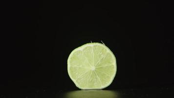 Human hand takes away a half of lime video