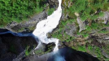 Breathtaking top-down aerial view of Voringfossen waterfall in Norway.