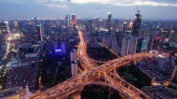 TL, WS Rush hour traffic on multiple highways and flyovers at night / Shanghai, China