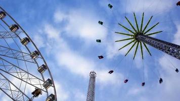 Amusement rides at a carnival upwards view video
