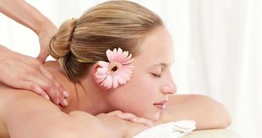 Masseuse massaging her client shoulder video