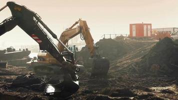 Excavators Digging Up Construction Site video