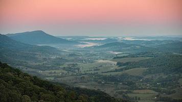 Mountain valley at sunset photo