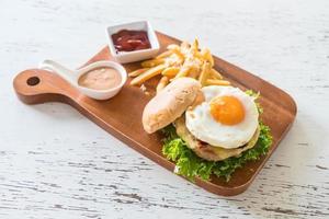 Hamburger with an egg on it photo