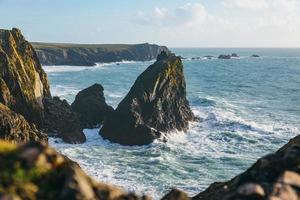 Rocky seascape during the day photo