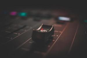 Close-up of a sound mixing board photo