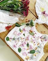 White and pink floral textile photo