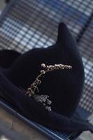 Witch hat with dried flowers photo