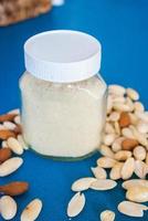 Small jar of Almond Flour with nuts, gluten free flour photo