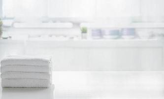 Stack of towels on a table photo