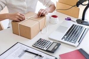 Close-up of a woman preparing a shipment photo