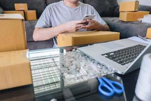 Close-up of a person shipping from home photo