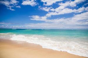 Ocean waves hitting the shore photo