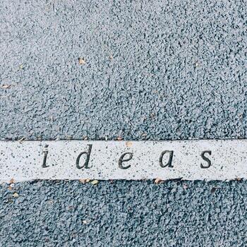 Ideas carved on concrete surface photo