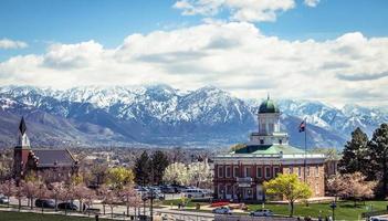 Small town surrounded by mountains  photo