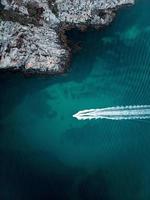 Aerial view of boat on the water photo