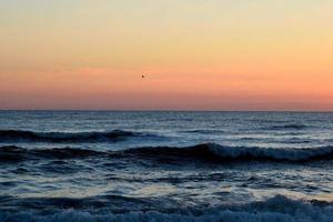 Sunrise at the ocean photo