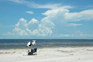 Beach chairs and umbrella  photo