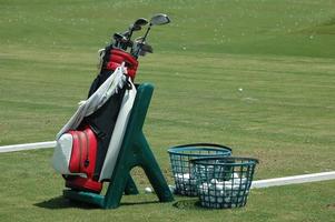 Golf bag and clubs photo