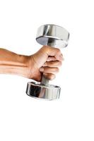 Close-up of a person holding a dumbbell photo