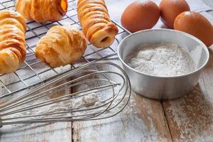 Bread and bowl of flour  photo