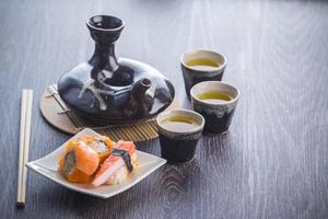 tea set and sushi photo