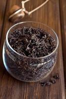 Black dried tea leaves