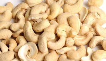 Cashew nuts on white photo